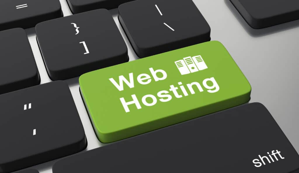 Une touche verte de clavier d'ordinateur avec le mot "web hosting"